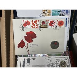 Approximately one hundred and fifteen Royal Mint coin covers, in two ring binder folders and loose, together with approximately 53 grams of Great British pre-1920 and approximately 68 grams of Great British pre-1947 silver threepence coins, and a small quantity of further pre-decimal coins