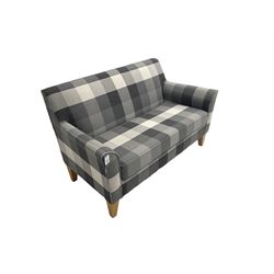Next - two seater sofa, upholstered in grey check fabric, on tapered supports