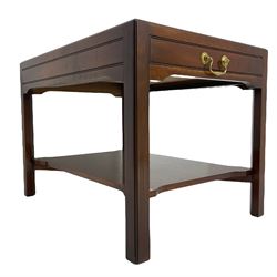 Mahogany side table or end table, the dished rectangular top with moulded edge, fitted with single end drawer, moulded square supports with inner chamfer united by under-tier 