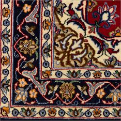 Two Central Persian rugs, ivory ground with a symmetrical foliate and floral design around a shaped cartouche medallion with a red floral and bird motif border with contrasting guard stripes, 142x76cm, Central Persian Kashan rug, crimson central field with a floral and foliate design with a stylized rosette medallion incorporating palmettes and scrolling vine work, enclosed by a dark navy border and multiple guard stripes, 117x68cm, (2)