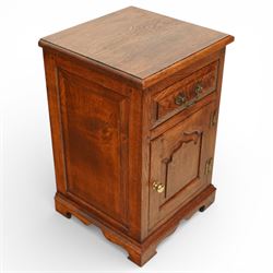 20th century pair of oak bed side cabinets, in the manner of Titchmarsh & Goodwin, plain rectangular tops over drawers fitted with brass handles and cupboard doors with carved arched panels, panelled sides and backs, raised on shaped bracket feet