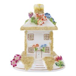 Collection of Coalport items, comprising floral mantel clock, houses including 'Park Lodge' 'The Umbrella House' 'Keepers Cottage', Coalbrookdale floral jar, and others; Kingmaker mouse ornament; Egyptian-style granite Bastet cat ornament, in one box