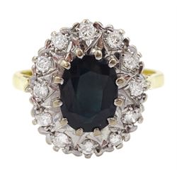 18ct gold oval sapphire and round brilliant cut diamond cluster ring, hallmarked