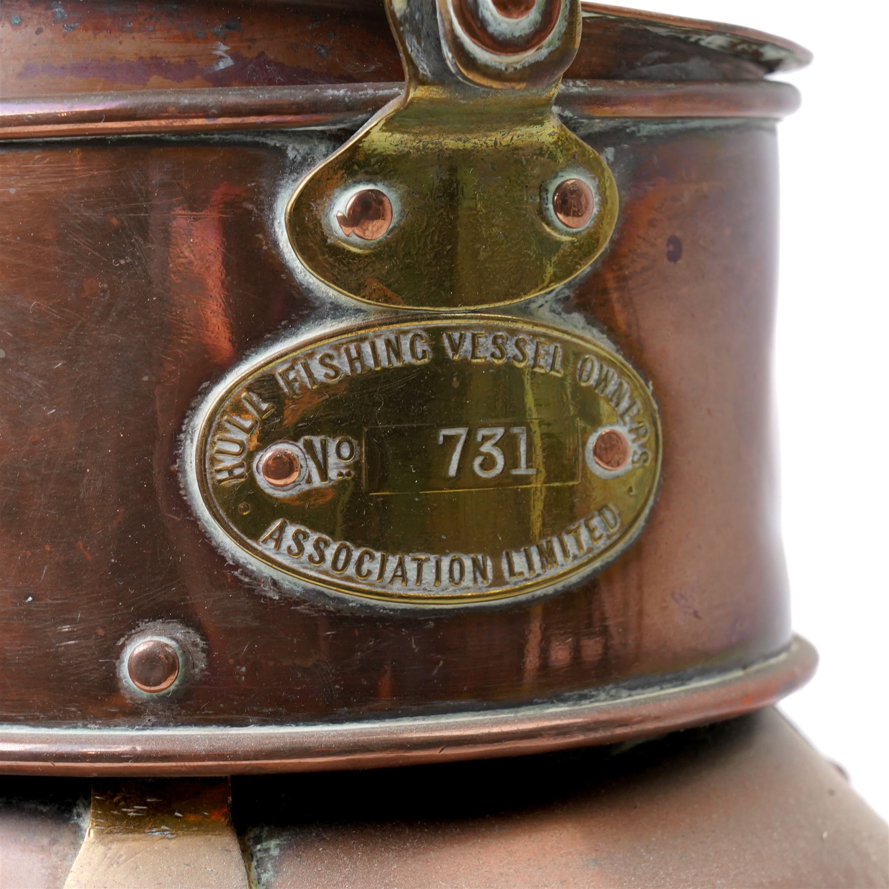 Large copper ships lantern 'Not under Command' by F & T Ross Ltd, Hull, with a plate inscribed 'Hull Fishing Vessel Owners Association Ltd No.731' and another plate inscibed 'S.T.Capel' H46cm
The S T Capel was a deep sea trawler launched in 1929, later renamed Arctic Hunter and used as a minesweeper in WWII