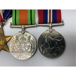 WWII group of five medals comprising 1939-45 War Medal, Defence Medal, 1939-45 Star, Africa Star and France and Germany Star on wearing bar; WWI British War Medal awarded to 142019 Pte. A. Thompson A.S.C.; and boxed King's Badge 'For Loyal Service'