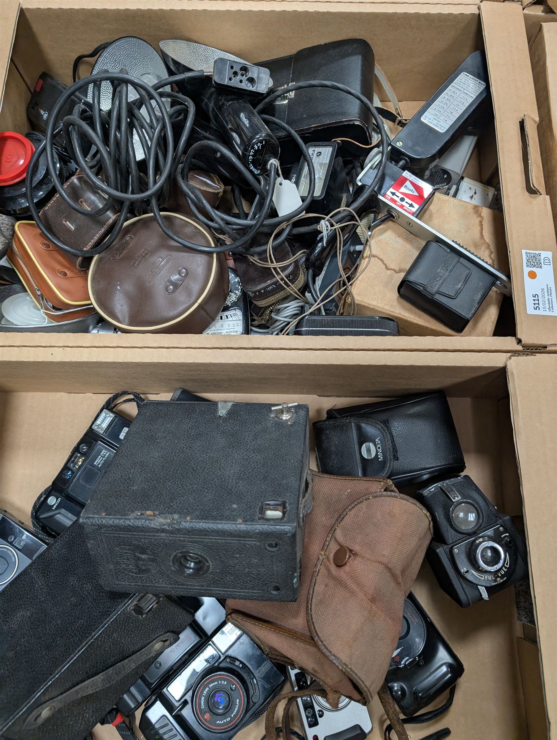 Collection of vintage cameras, projectors and accessories, including Kodak Brownies, Praktica, Polaroid, Ensign, light meters, flashes, etc