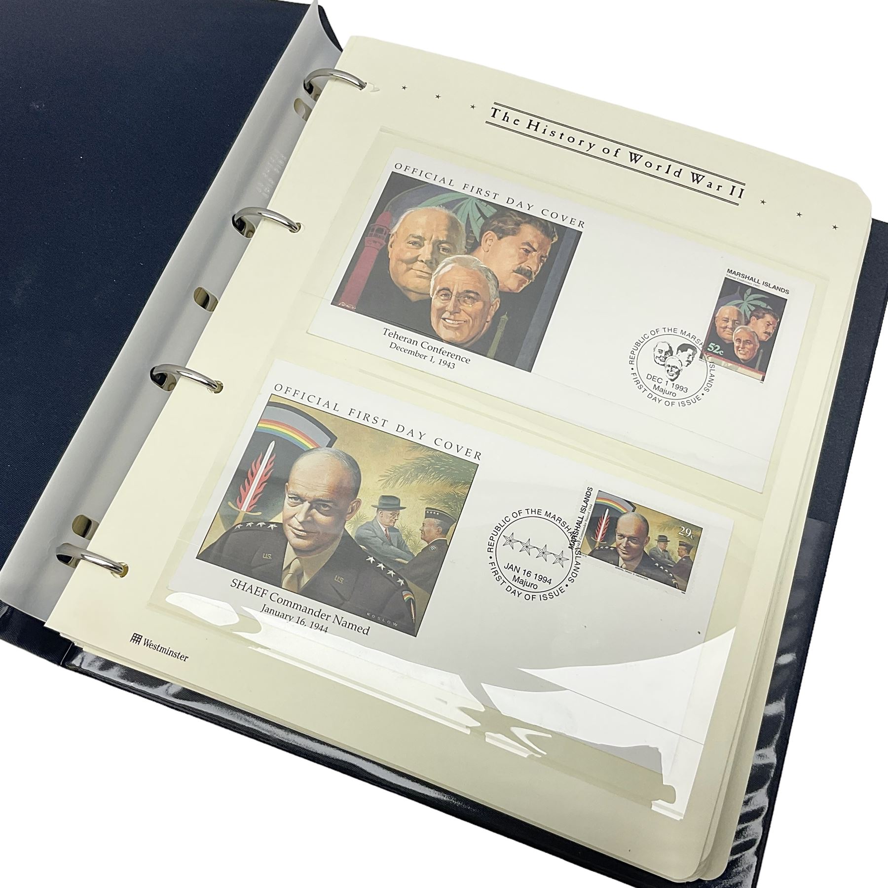 Various first day stamp covers from 'The History of World War II' collection, housed in the ring binder album