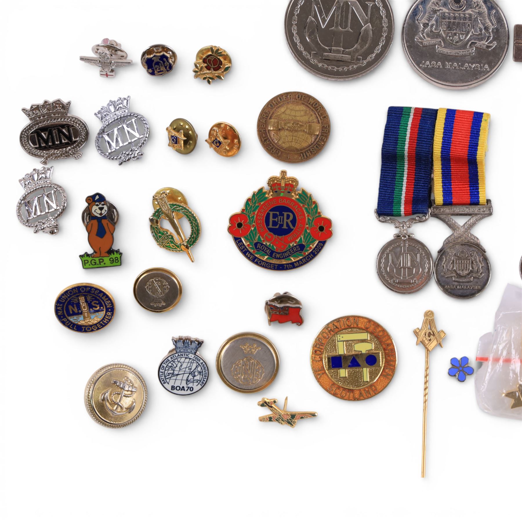Two silver Merchant Navy service medals, both hallmarked, five other medals including miniatures and a collection of enamel pin badges