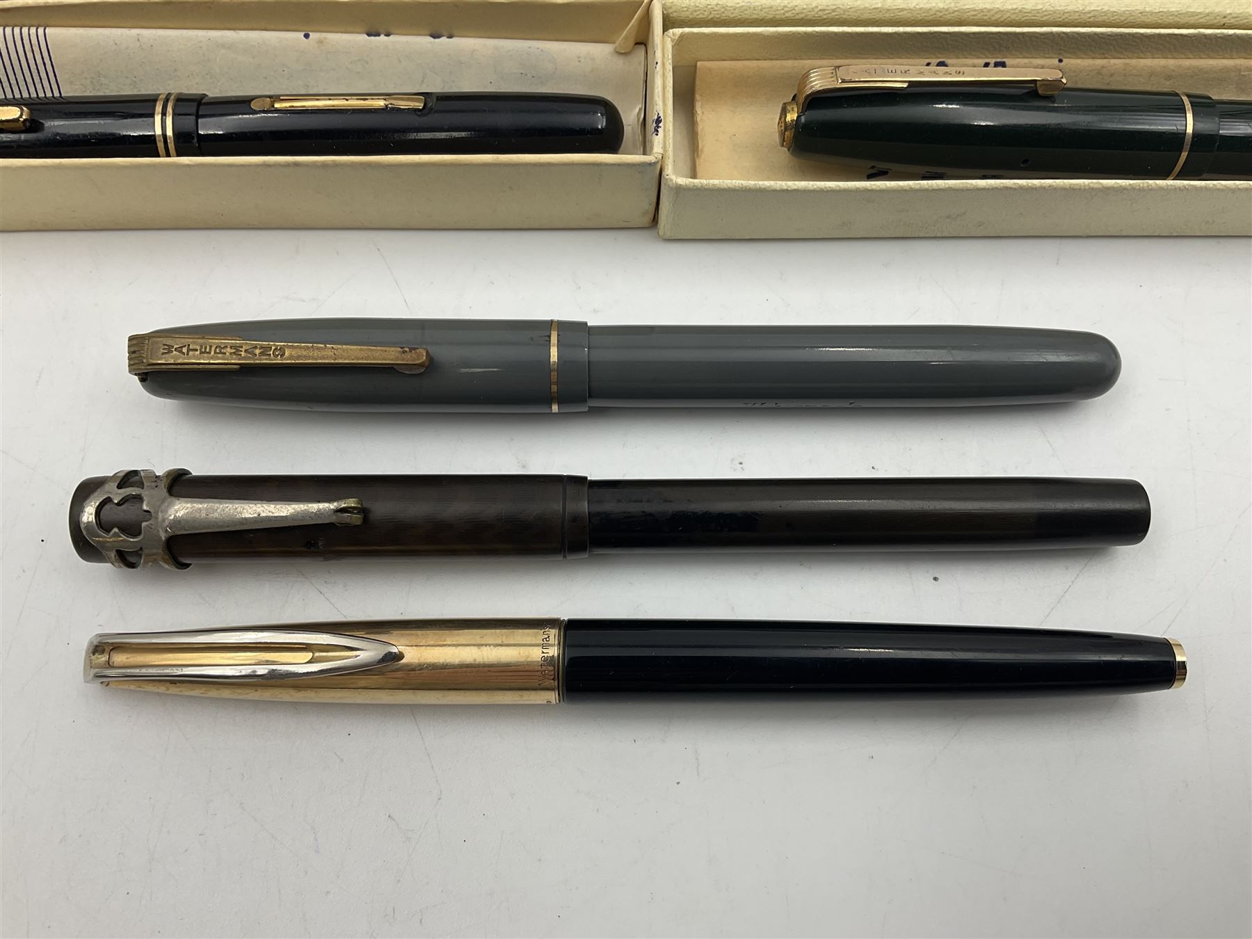 Five Waterman's fountain pens, to include Ideal, 152V, 701 etc, four with 14ct gold nibs