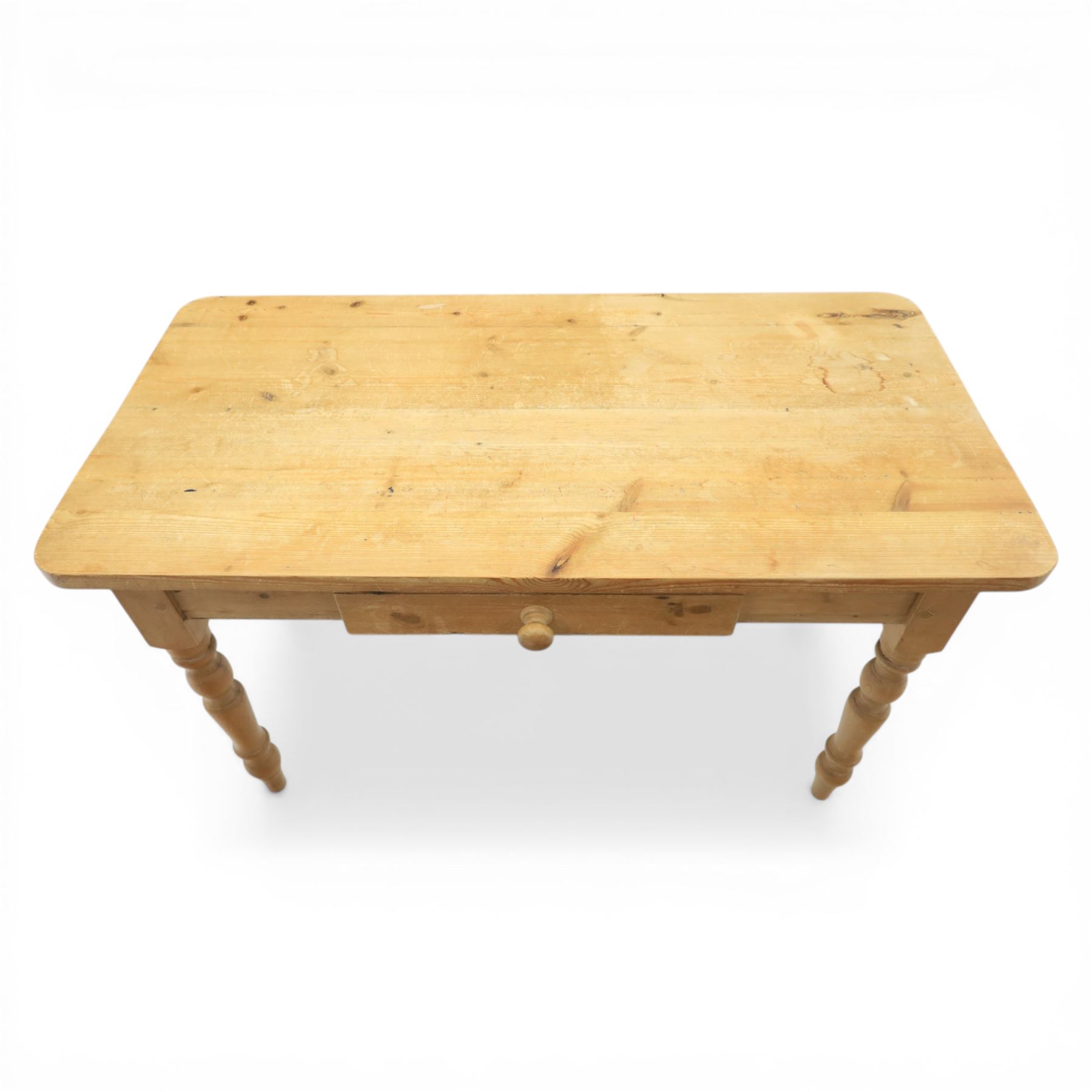Victorian design stripped pine table, rectangular top with rounded corners, single centre drawer, raised on four turned legs