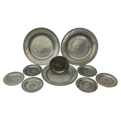 Collection of early 18th century pewter, comprising three large chargers, and seven plates, with various marks and touch marks verso, including the Crowned Rose and shield pseudo 'hallmarks', chargers D46cm and D42cm, plates D23cm.