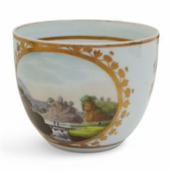 19th century teacup and saucer, possibly Coalport, decorated with panels of flowers on a cobalt blue ground with gilt decoration; together with two other teacup and saucer pairs, one with hand painted landscape decoration 