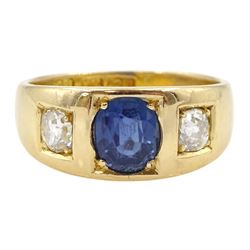 Late 19th century continental gypsy set three stone oval sapphire and old cut diamond ring, stamped 18ct, makers mark HA, total diamond weight approx 0.45 carat, sapphire approx 1.05 carat