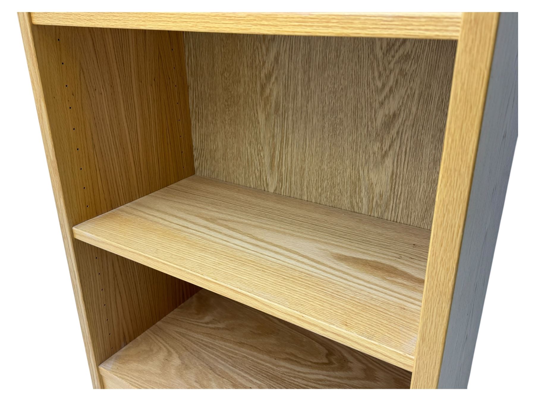 Light oak 6' open bookcase, five adjustable shelves