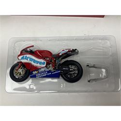 Four Minichamps 1:12 scale die-cast motorcycles - Honda RC211V Team Movistar Honda MotoGP Rider Marco Melandri MotoGP 2005; Yamaha YZR-M1 Antena 3 Yamaha D'Antin Shinya Nakano MotoGP 2003; Yamaha YZR-M1 Max Biaggi MotoGP 2002; and Ducatti 999FO4 Gregorio Lavilla BSB 2005; all boxed (4)