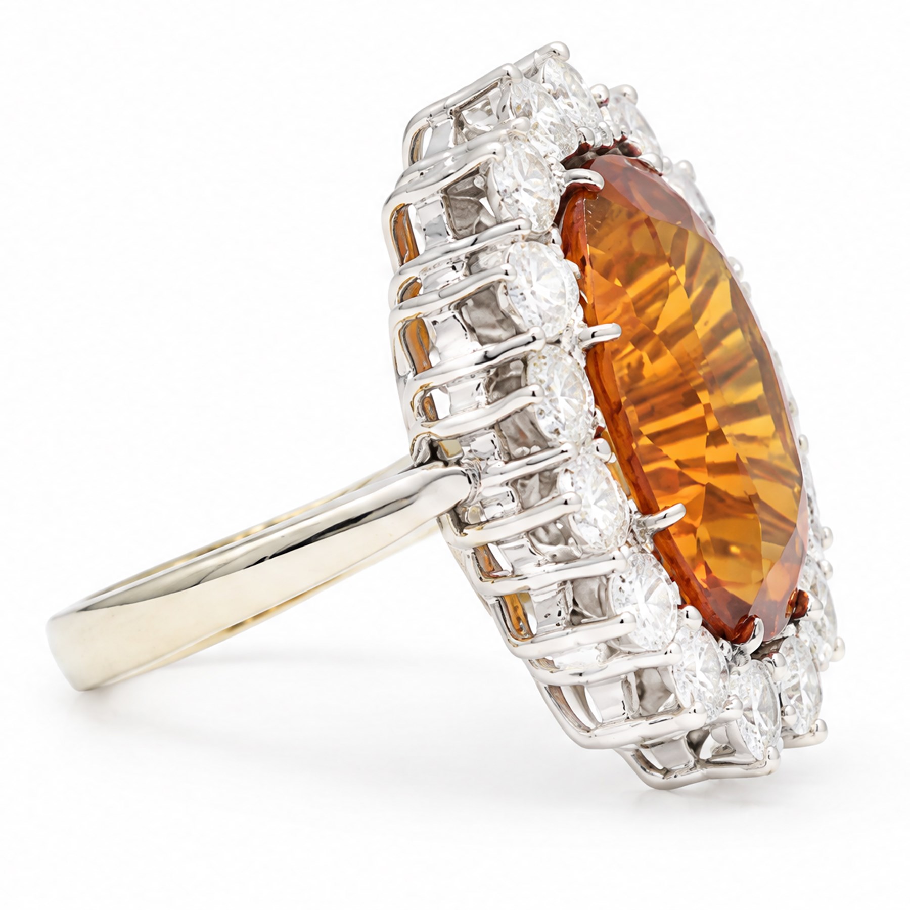 18ct white gold citrine and diamond cluster ring, single oval cut citrine of approx 4.30 carat, surrounded by sixteen round cut diamonds, total diamond weight approx 0.95 carat