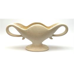 A Fulham Pottery post-war mantle vase or planter, designed by WJ Marriner, the white glazed body with twin scroll loop handles, (both handles a/f), with impressed mark beneath, H26cm L57cm.