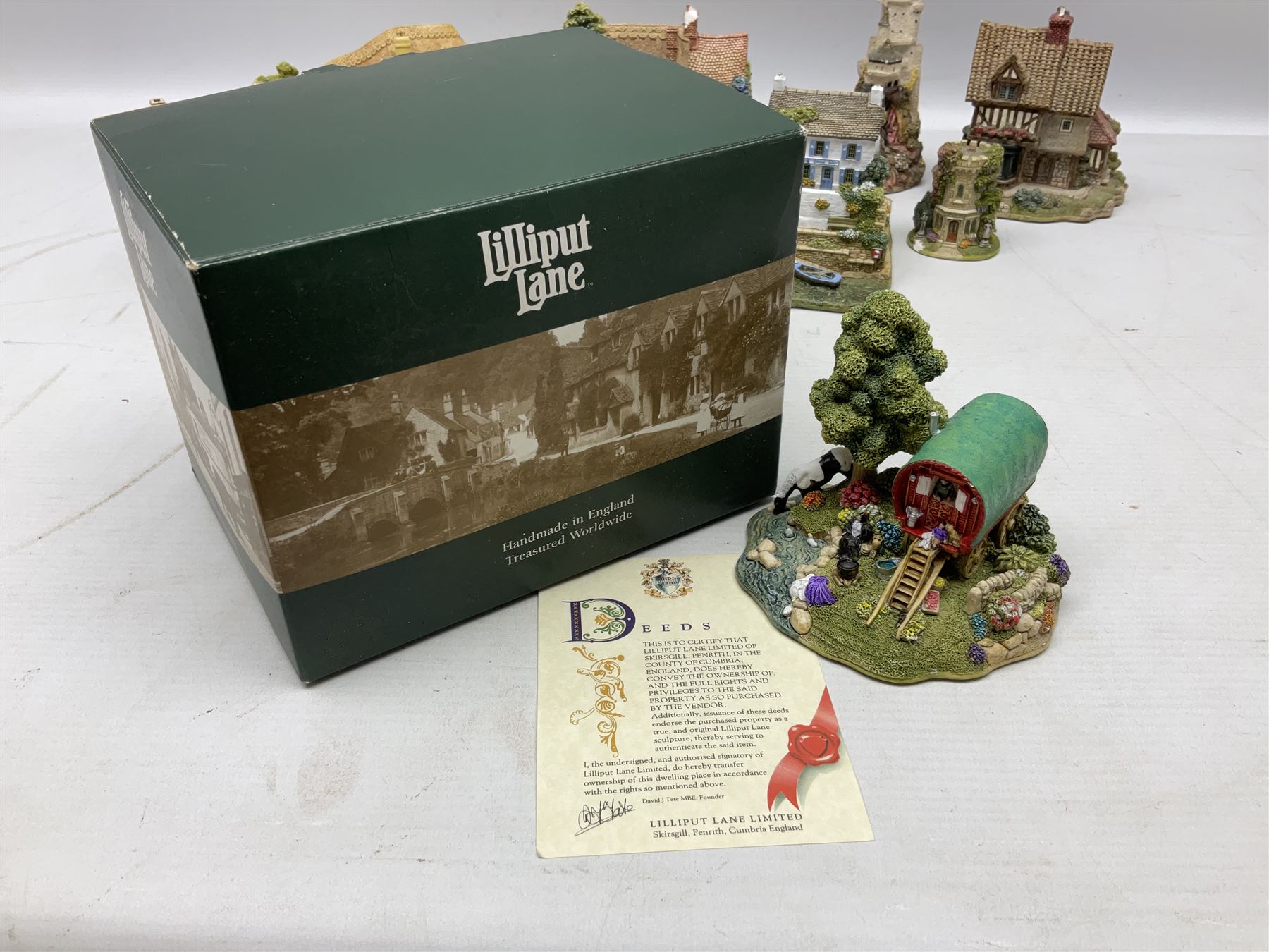 Sixteen Lilliput Lanes, to include The Golden Jubilee, Round Tower - Windsor Castle, Castle of the Golden Chalice, Travellers Rest, with box and deed,  Summer Days, Sunshine Creek, Writing with Lewis Carol, with box and deed,  etc 