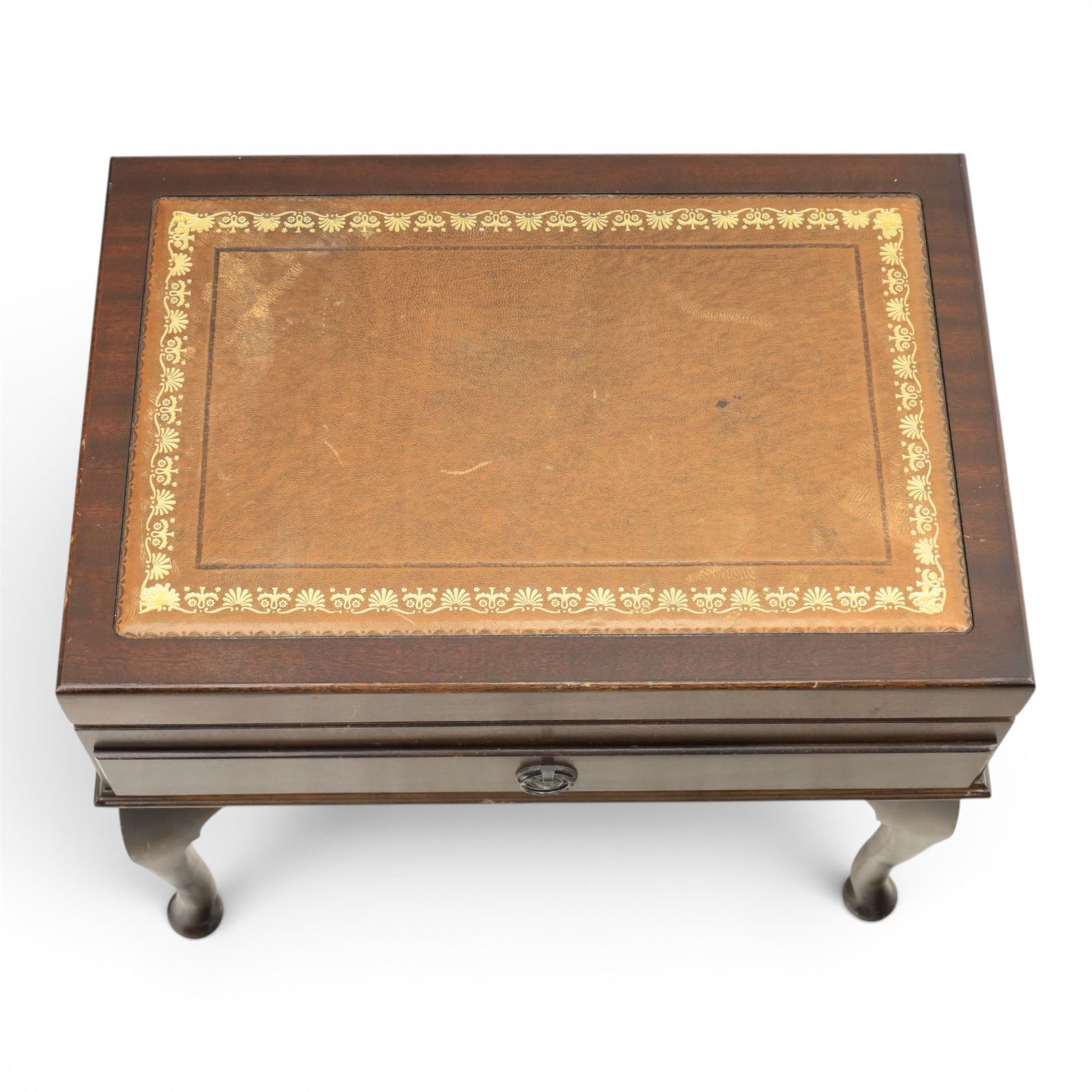 20th century mahogany canteen table, rectangular hinged top inset with gilt tooled leather writing surface, opening to fitted interior containing silver plated cutlery, with lower fitted drawer, on cabriole supports with pad feet