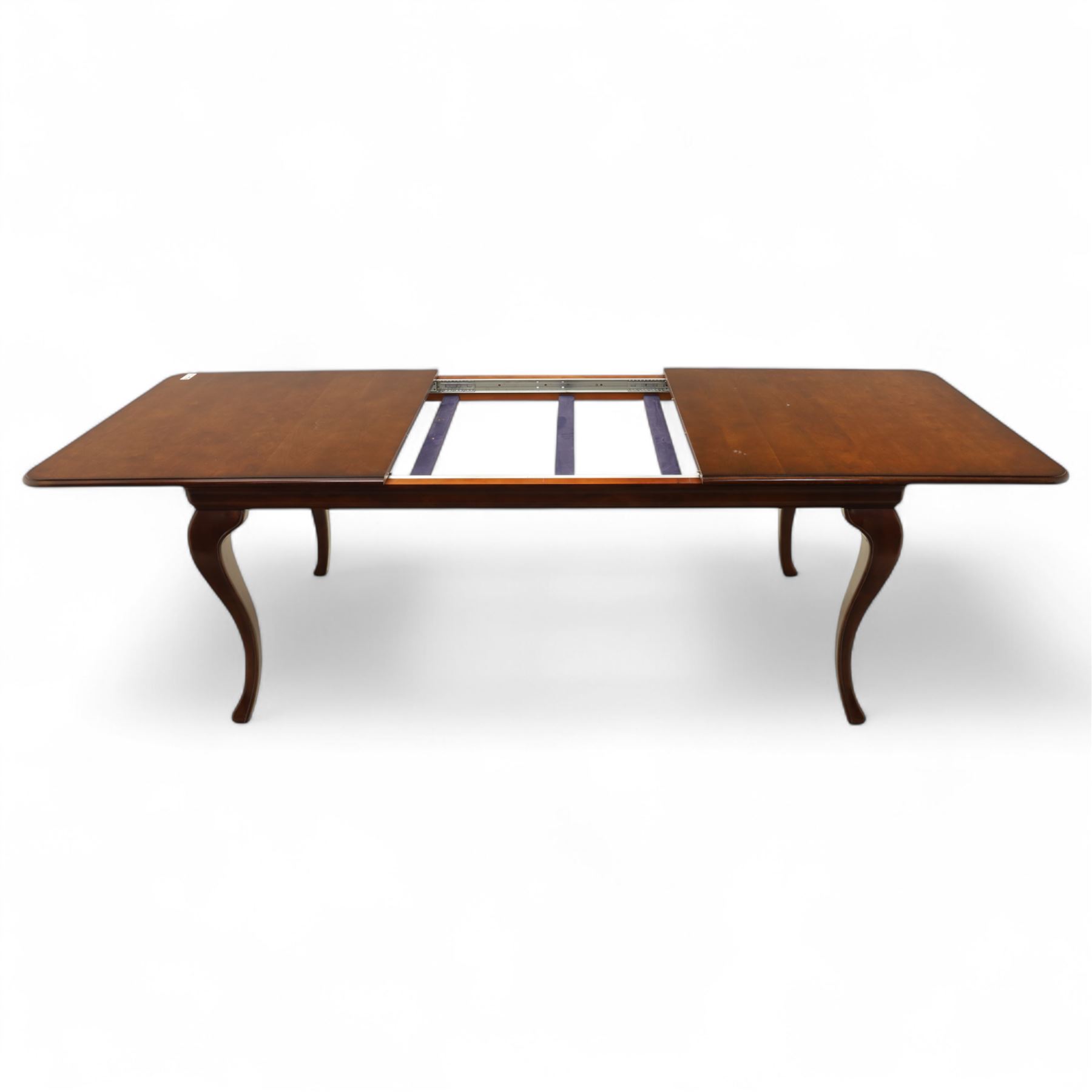 Willis & Gambier - mahogany extending dining table, rectangular top with rounded corners on cabriole legs, with two 35cm extension leaves, four Willis & Gambier upholstered high back chairs and four mahogany chairs, upholstered in a stripped multi-coloured velvet fabric, with scroll-shaped top rail, lyre-shaped back splat on cabriole legs, chairs W46xD91x97cm (11) 
