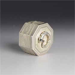 Silver trinket box, of hexagonal form, engraved with entwined snakes to body and decorated to the removable cover with a snake with sapphire set eyes, hallmarked Jonathan Braganza, London 2012, H3cm, W4cm