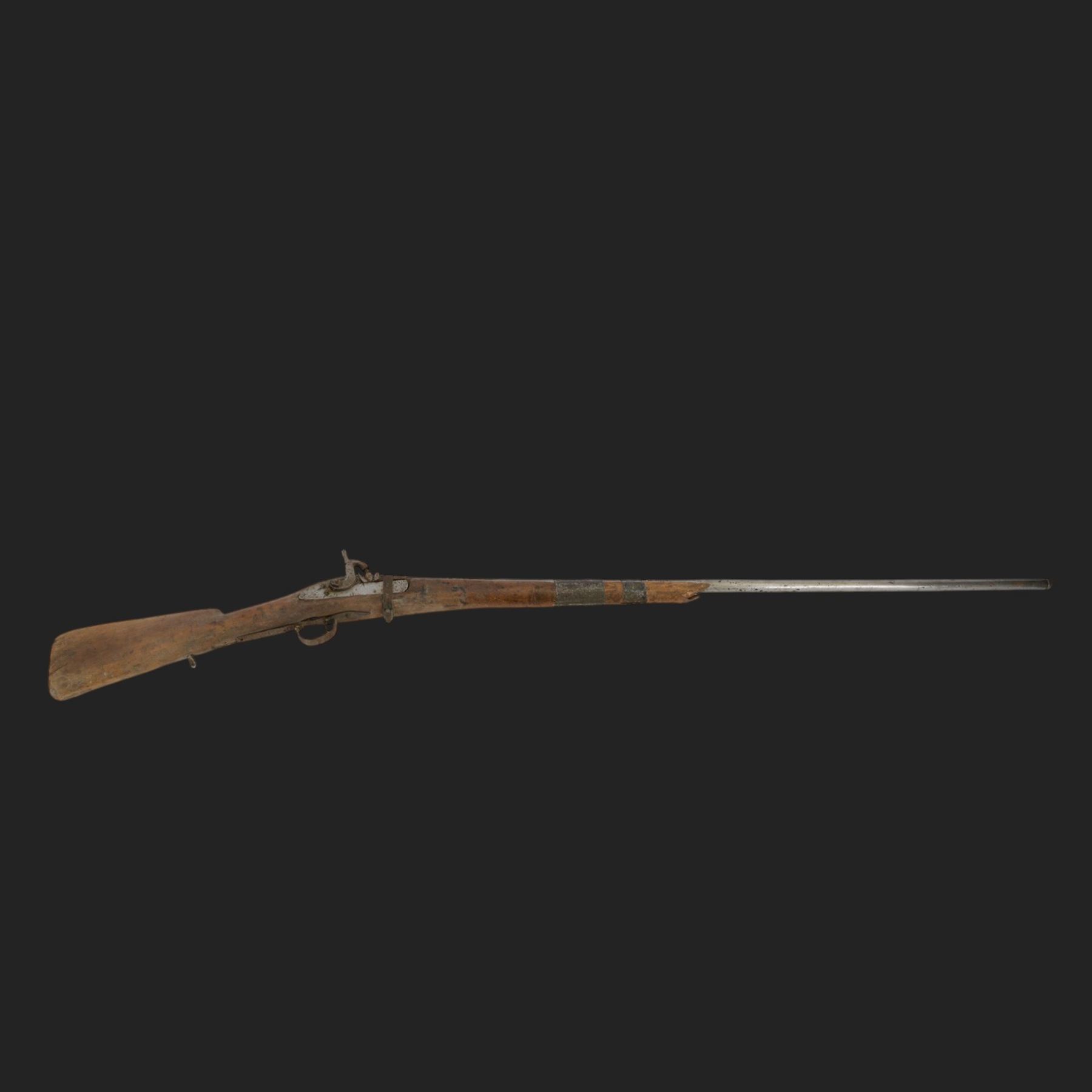 Middle Eastern percussion cap rifle, the 107cm  barrel with four brass bands and ramrod under, overall L143cm, together with another percussion rifle the 106cm barrel a copy of a 17th century Spanish barrel, complete with fake stamp, by vendors repute this rifle was confiscated from tribesmen in Kurdistan by police
Sold as an exempt item under Section 58 (2) of the 1968 Firearms Act, to be held as a curiosity or ornament