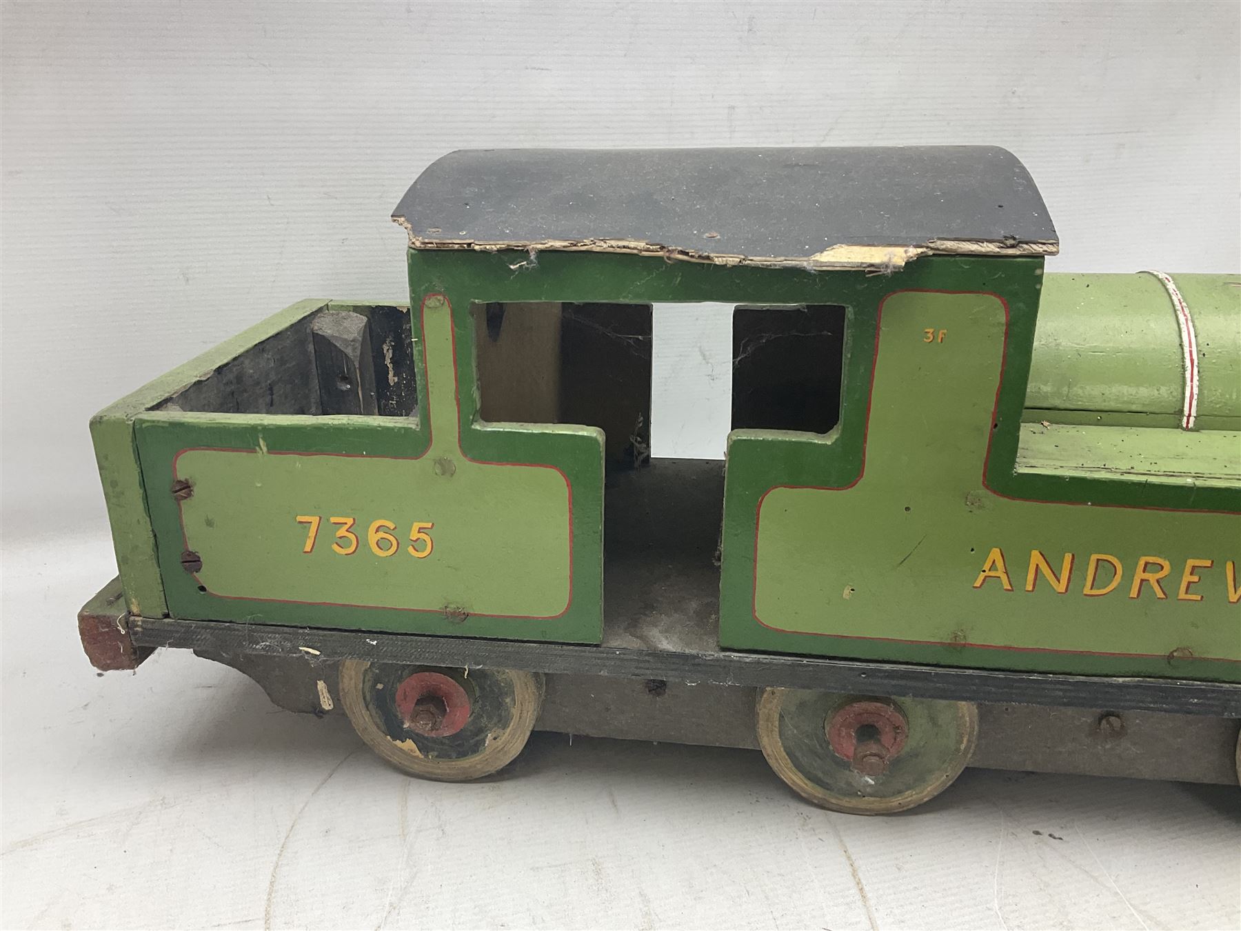 1960s scratch-built green, black and red painted wooden model of a 4-6-0 tank locomotive 'Andrew' No.7365 L88cm; and an unused wall mounting die-cast model display cabinet with glass door and shelves 52 x 40cm (2)