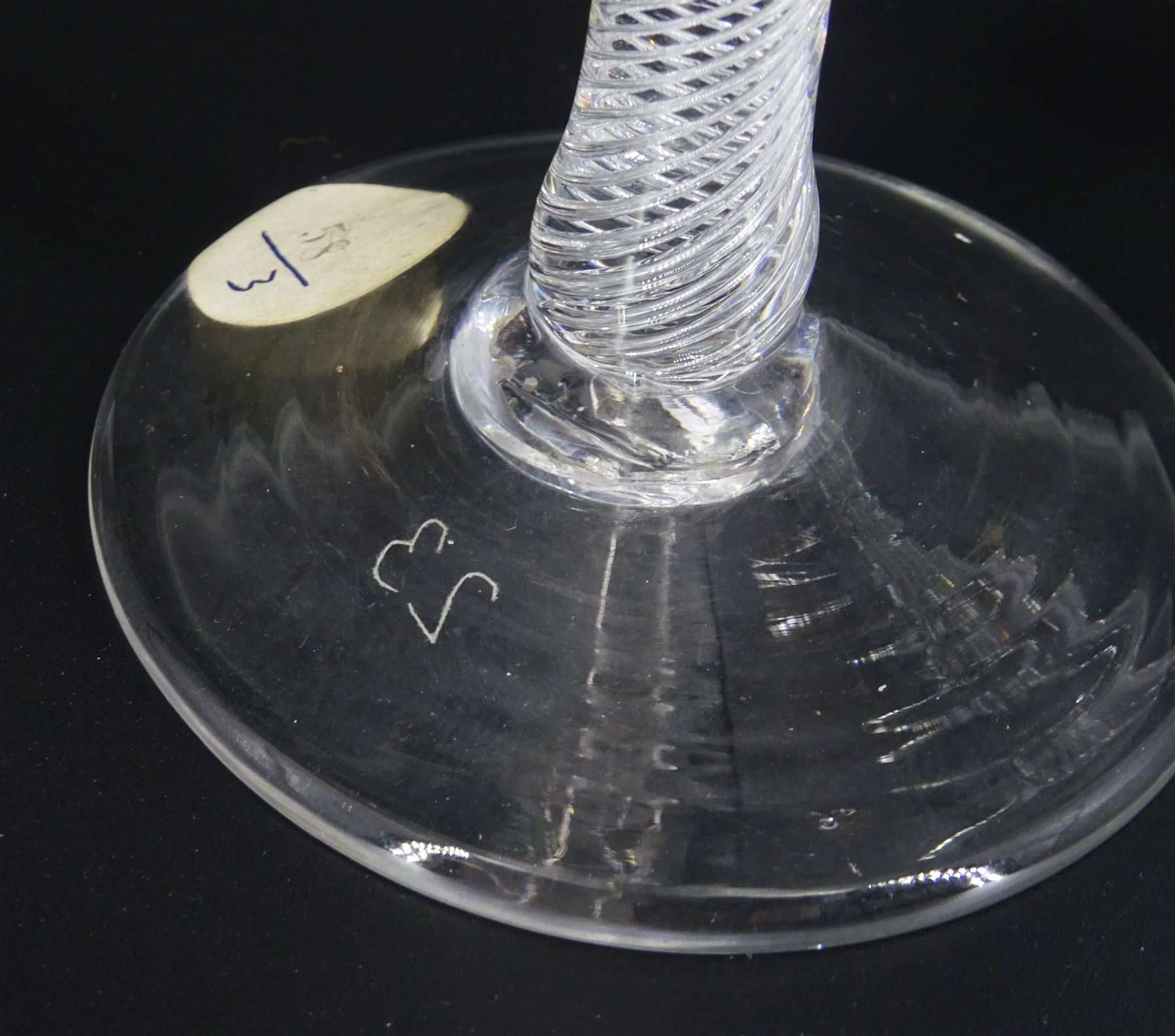 18th century ale glass, the funnel bowl raised upon a single series air twist double knopped stem and conical foot, H20cm, together with a similar smaller drinking glass, H15.5cm