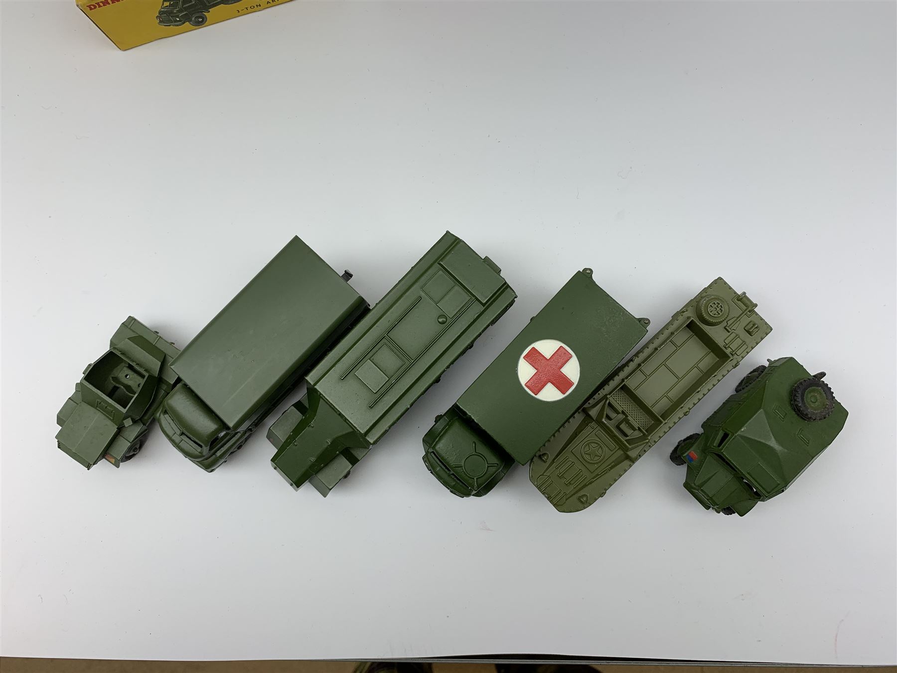 Dinky - six military vehicles - Military Ambulance No.626; Armoured Command Vehicle No.677; Field Artillery Tractor No.688; 3-Ton Army Wagon No.621; Scout Car No.673, all boxed; and D.U.K.W. Amphibian No.681 with box base (6)