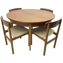 G-Plan - mid-20th century teak extending circular dining table, with concealed additional leaf (W114cm, H72cm); and a set of four mid-20th century teak dining chairs, seat upholstered in beige fabric