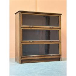 Early 20th century mahogany three height barristers bookcase with glazed up and over doors...