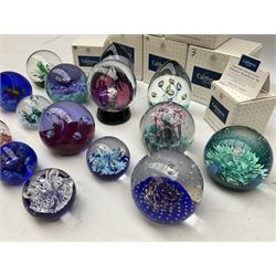 Fifteen Caithness paperweights, to include Aquamarina, Starlight, Moonflower, Once Upon a Time, Dewdrop Orchid, miniature moonflower etc, with some original boxes 