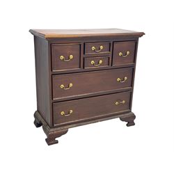 Georgian design mahogany chest, fitted with six drawers, on ogee bracket feet