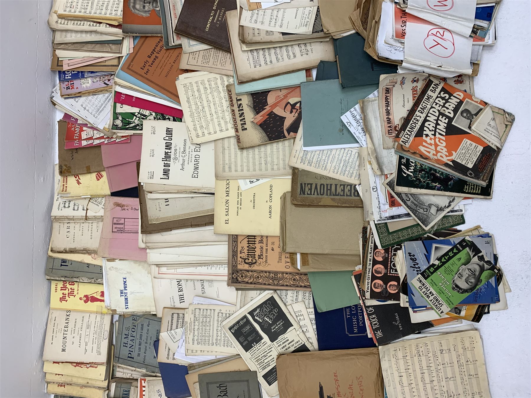 Steinway & Sons - late 19th century figured walnut upright piano, iron framed and overstrung, model no. 56174 circa. 1886, W154cm, H137cm, D70cm, together with a quantity of sheet music