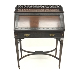  Late Victorian mahogany Chinese Chippendale style bureau, blind fret carved rail and fall front, open fret gallery, fitted interior and skiver, tapering supports joined by shaped cross stretcher on brass capped ceramic castors, single working key, W80cm, H105cm, D42cm  