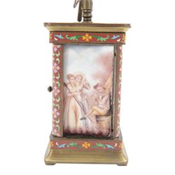 Late 20th century- Chinese 8-day timepiece carriage clock with Cloisonne work on a red ground to the four pillars, base and cornice, with painted porcelain panels to the sides, white enamel dial with Roman numerals and trefoil steel hands, platform escapement wound and set from the rear. With Key.