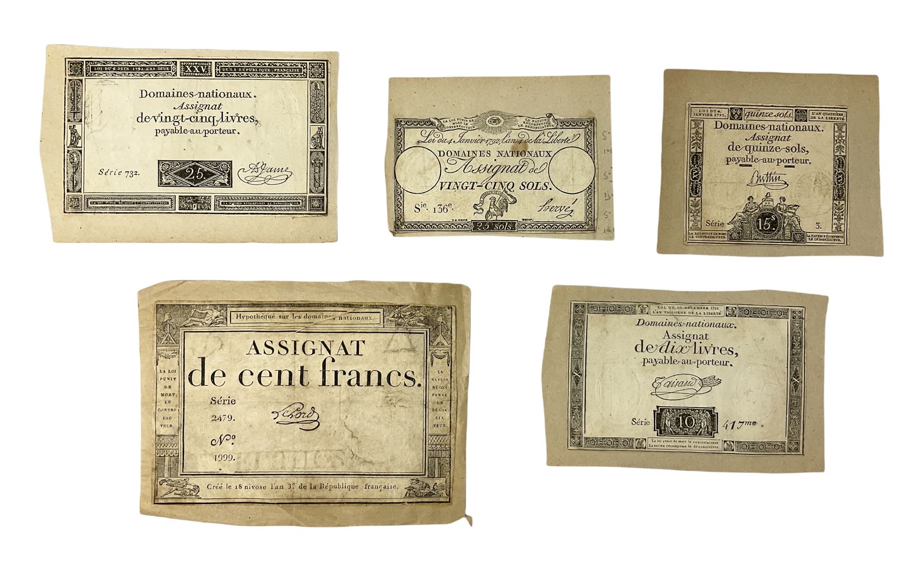 Five French Revolutionary period assignat notes (notes of this type were issued between 1789 and 1796), each mounted on paper