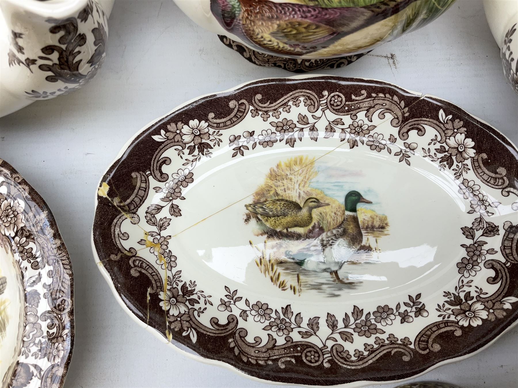 Royal Worcester Palissy Game Series pattern tea and dinner wares, to include two teapots, coffee pot, twelve cups and saucers in two sizes, four dinner plates etc (40) 