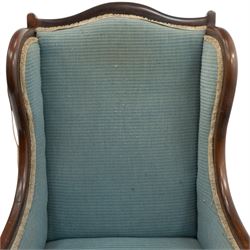 Edwardian armchair of squared form upholstered in blue fabric, serpentine seat front, shaped frame raised on cabriole supports