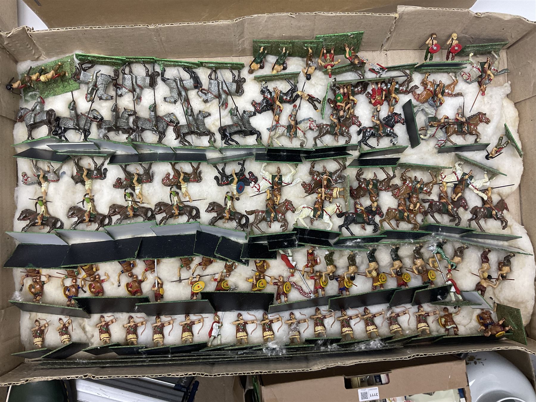 Painted metal wargame figures - over four hundred including Normans and Saxons, Romans, British Tribes etc; together with a quantity of part-painted and unpainted figures, battlefield weapons and accessories etc; average size 25mm