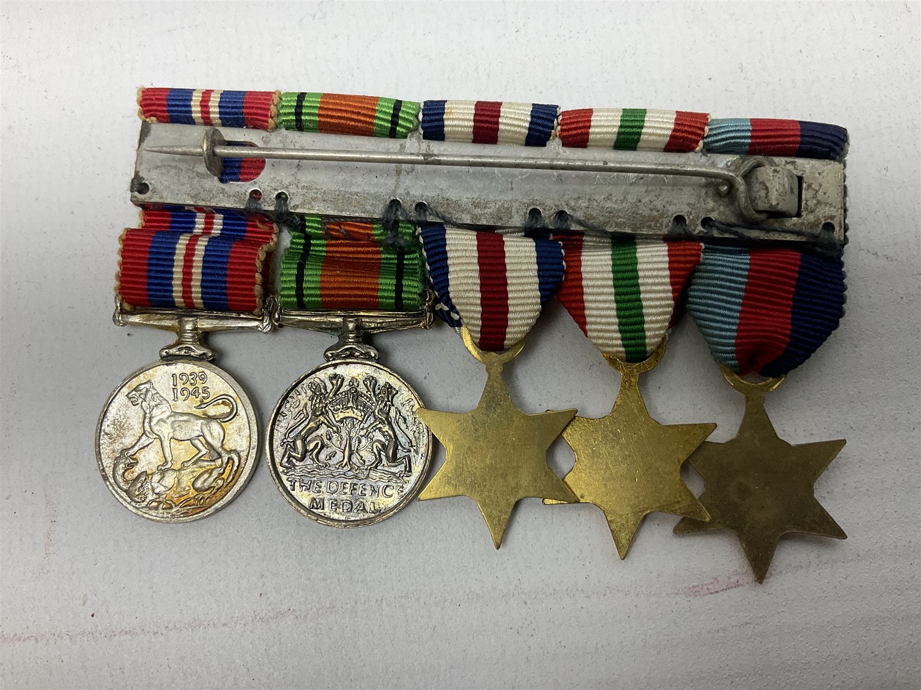WW2 group of five medals comprising Defence Medal, 1939-1945, Italy Star, French and German Star and 1939-1945 star, with miniatures  
