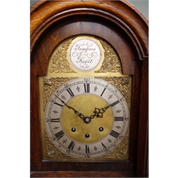  Early 20th century oak cased grandmother clock, with arched brass dial, triple train movement striking the quarter hours on rods, H167cm  