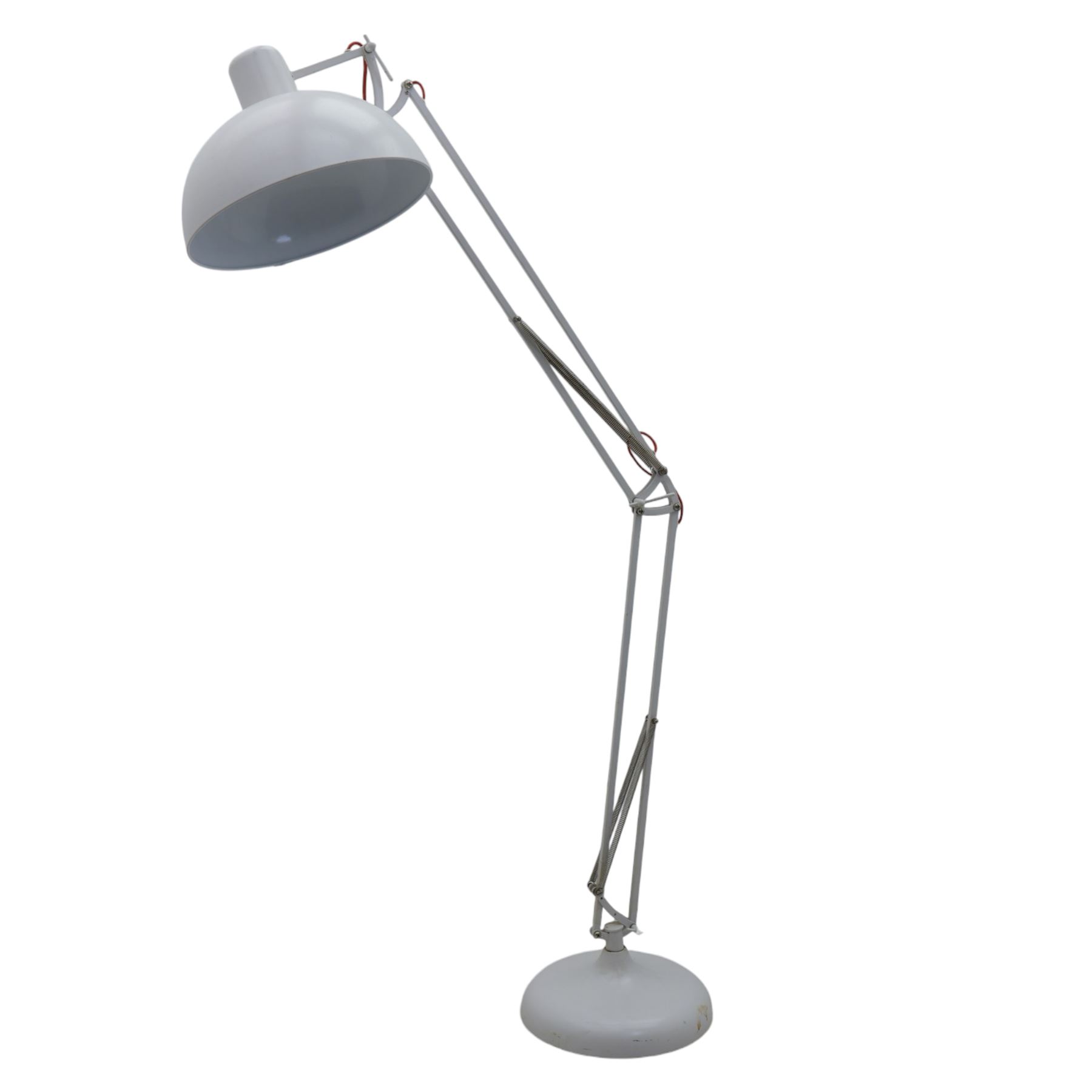 Contemporary white floor lamp, in the manner of Anglepoise, counter balance sprung arm, red cord with a weighted base 