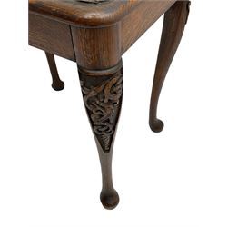 Late 19th century oak table, rectangular top with band carved scrolls and dragon masks, on cabriole supports 