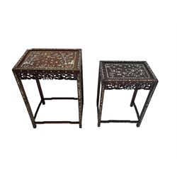 Nest of two mother of pearl inlaid hardwood tables, the rectangular tops decorated with cherry blossom trees and hunter inlay scenes, pierced and carved friezes with flowerhead and bird pattern, raised on square supports united by shaped stretchers