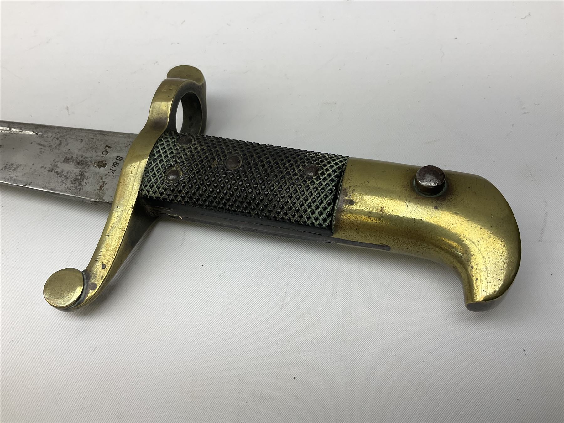 British 1855 pattern 'Sappers & Miners' Lancaster sword bayonet as issued to Medical Corps, the 62cm steel blade marked S&K with various numbers; in brass mounted leather scabbard numbered 1176