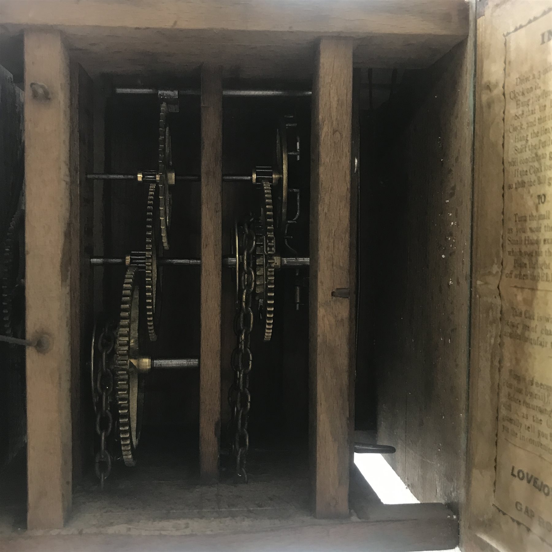 Early 20th century Postman’s alarm clock, circular beech frame dial, D28cm (no weight or pendulum)