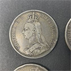 Four Queen Victoria crown coins dated 1887, 1889 and two 1893