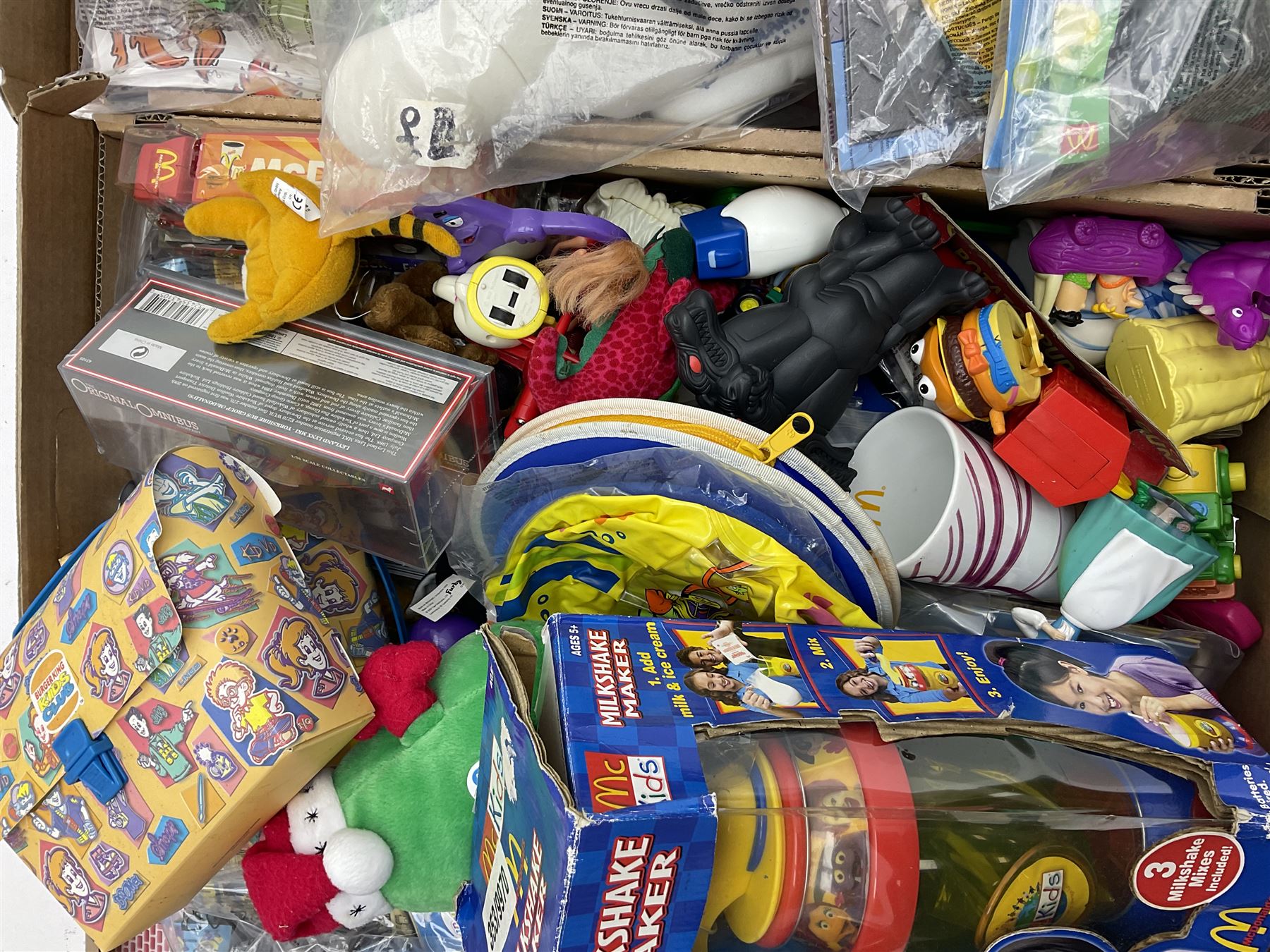 Large quantity of Mcdonalds toys to include Matchbox in four boxes