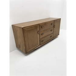 ercol light elm sideboard fitted with three drawers and two cupboards, W156cm, H68cm, D44cm